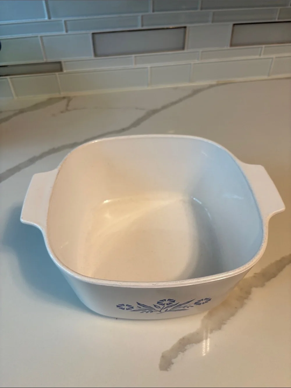 Vintage, 3 Liter Corningware White Casserole Dish with Blue Floral Pattern.